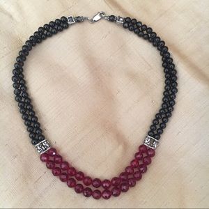 Black and red necklace.